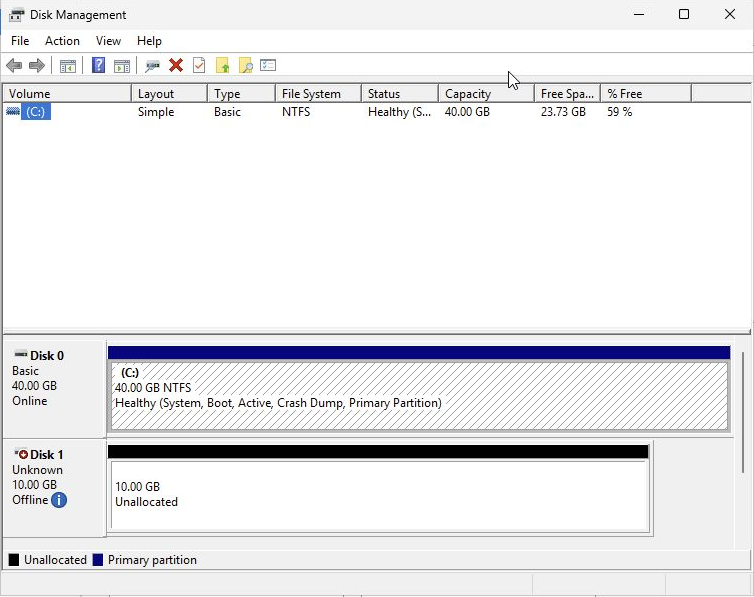 Disk Management showing the existing Windows disk and a separate new 10 GB offline disk