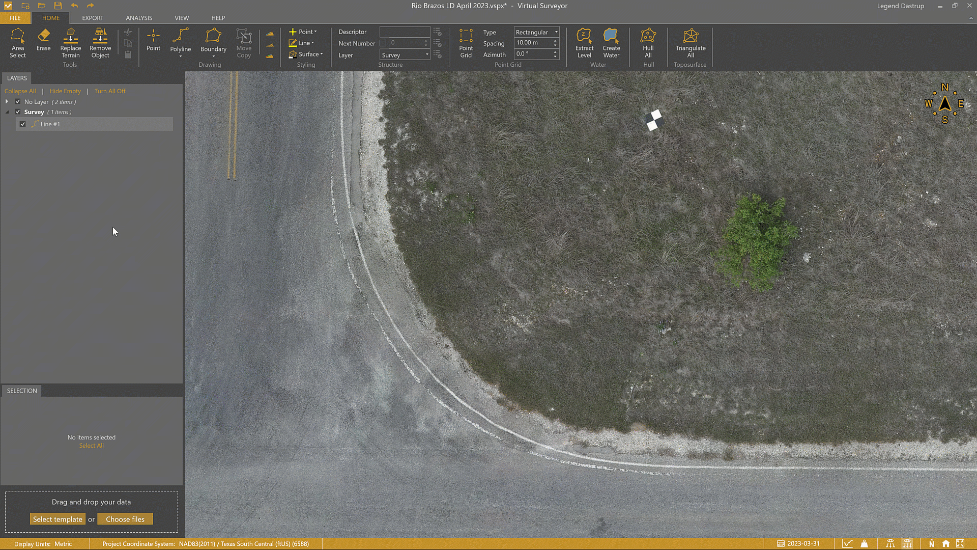 Using the Arc tool to properly draw the edge of a turn on a road.
