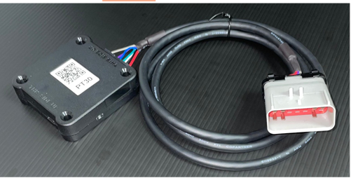 A picture containing indoor, adapter
Description automatically generated