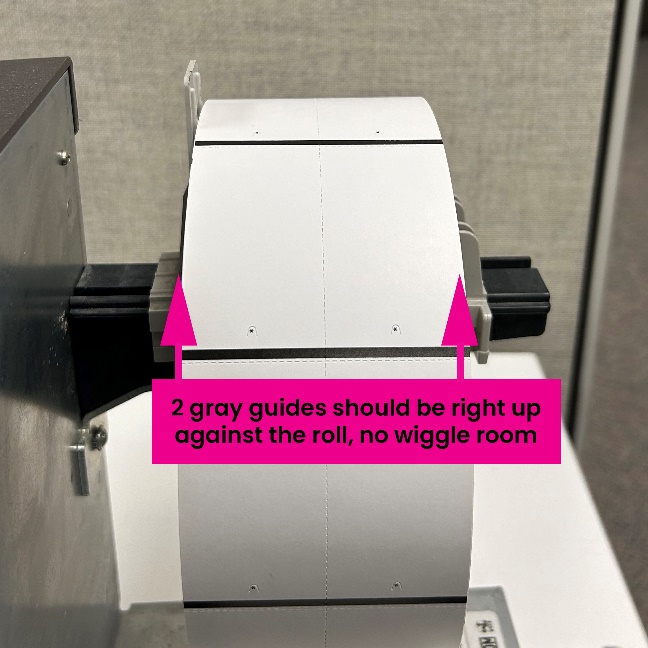 A roll of paper on a machine

Description automatically generated