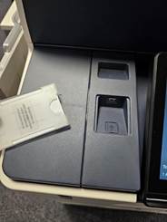 A device on a desk

AI-generated content may be incorrect.