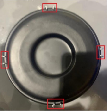 A close up of a black object

Description automatically generated