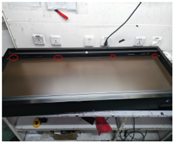 4 screws securing bracket that holds flame display board