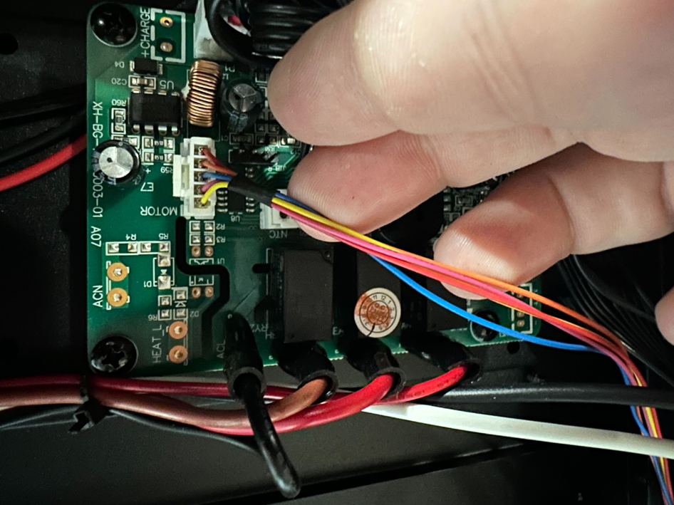 Disconnect flame motor cable from control board