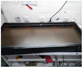 4 screws securing bracket that holds flame display board