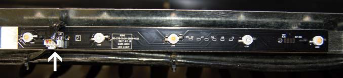 Arrow pointing to cable connection on ember bed LED light strip