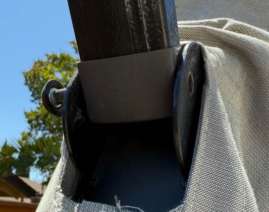 A metal pole with a piece of fabric

AI-generated content may be incorrect.
