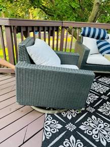 A chair on a deck

Description automatically generated