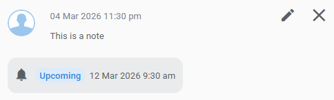 Note displaying an attached reminder with scheduled date and time