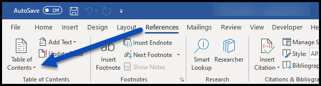 The References tab is open and the arrow next to the Table of Contents button is highlighted.  