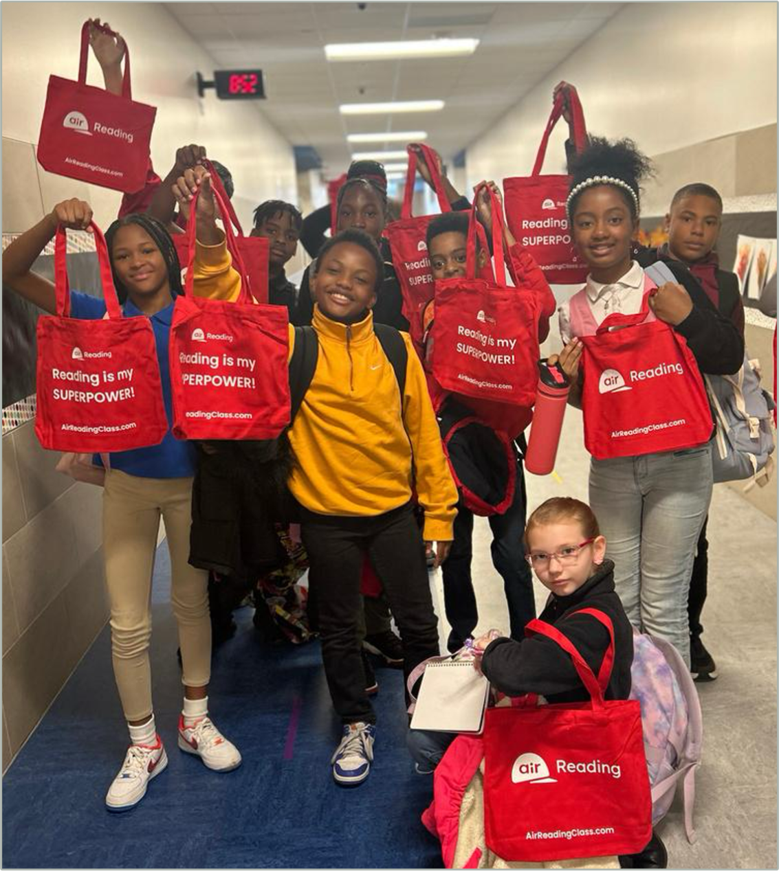 Image of students from Crandall with their Air Reading bags.