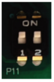 A close up of a switch 
AI-generated content may be incorrect.