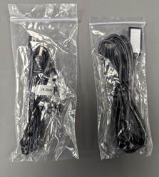 A couple of plastic bags with black cords

AI-generated content may be incorrect.