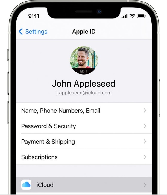 An iPhone showing the screen at Settings > [your name]. iCloud is selected.