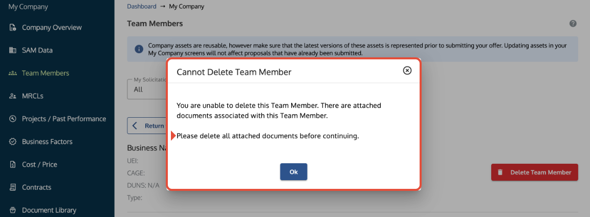 Message box directing the user to remove all documents before deleting a Team Member.