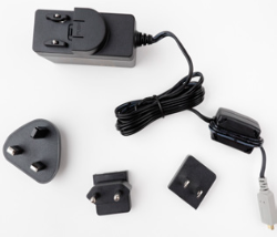 A picture containing adapter, charger, arranged 
Description automatically generated