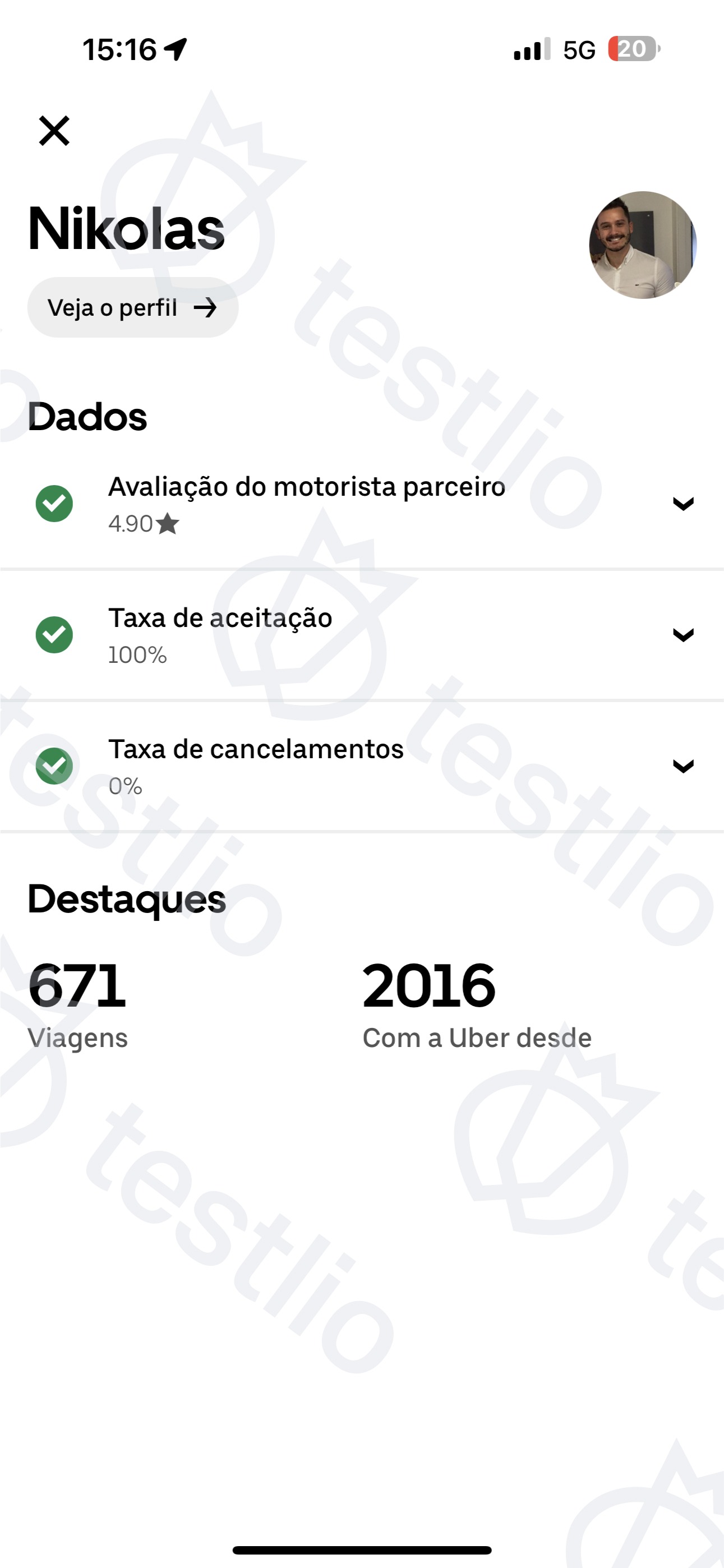A screenshot from a mobile phone showing an Uber profile for a driver name Nikolas.