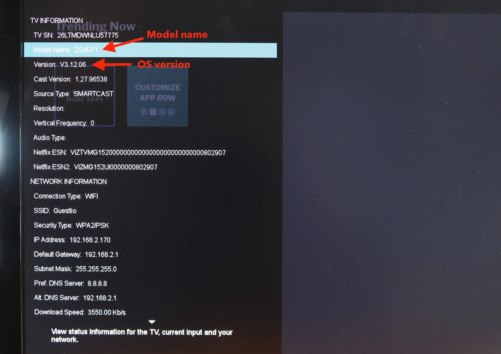 An About screen for a Vizio TV with the Model and Version highlighted.
