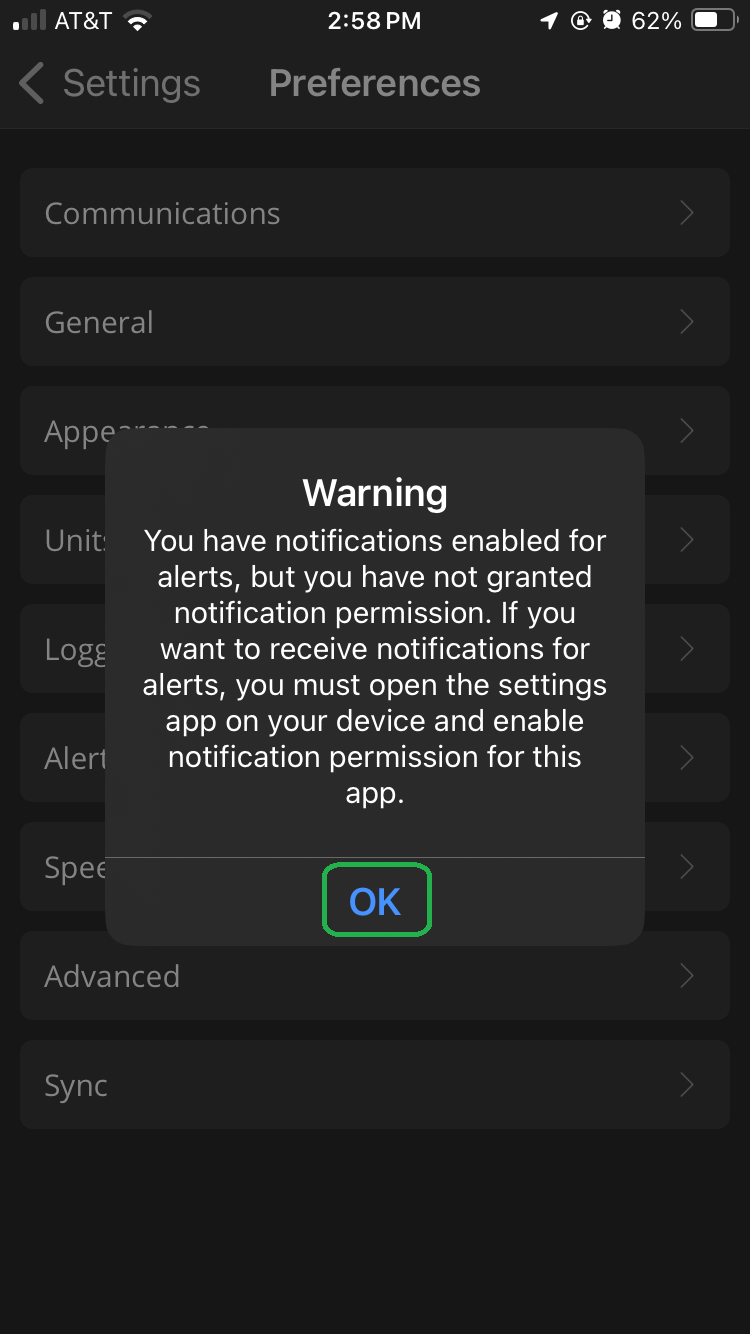 iOS Preferences screen showing a Warning message. The OK button is highlighted.