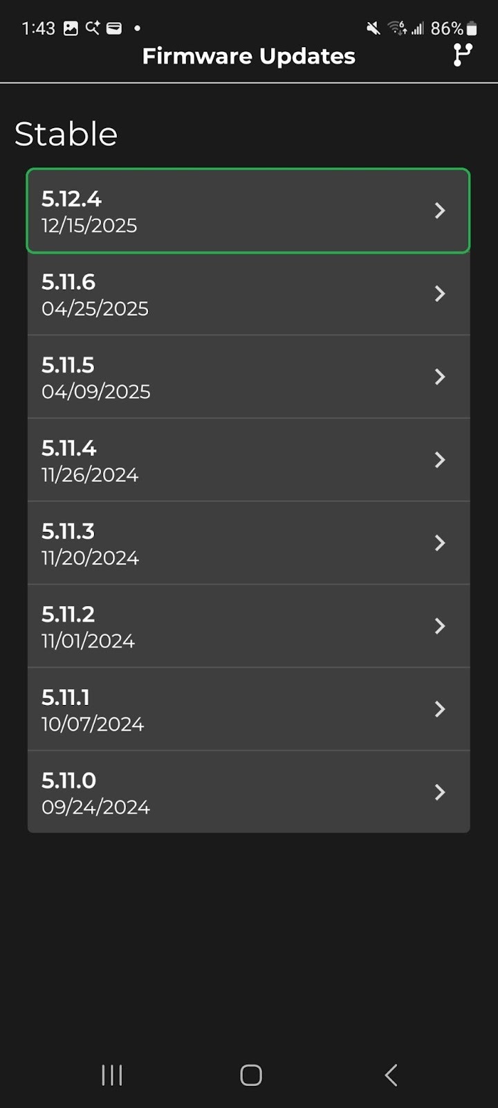 Android screen showing a list of available Firmware Versions. The version at the top of the list is highlighted.