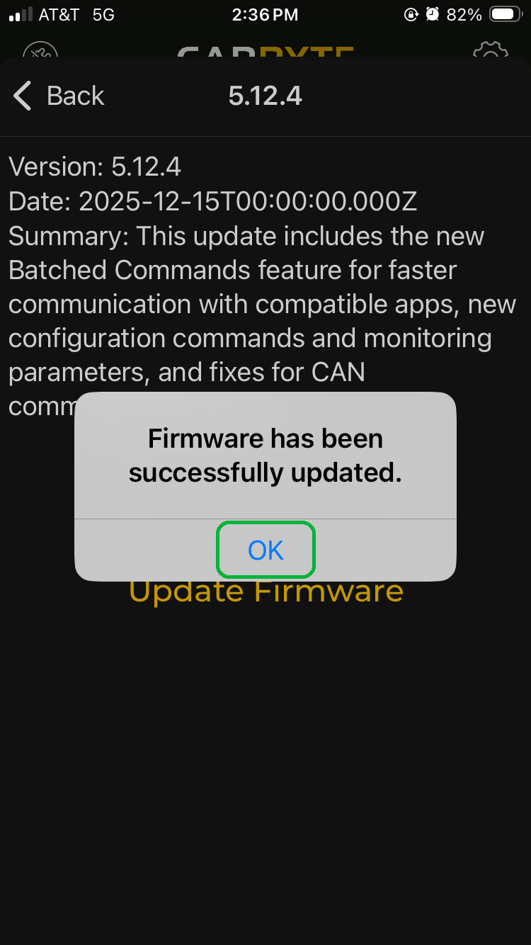 iOS screen showing a confirmation message saying "Firmware has been successfully updated." The OK button is highlighted.