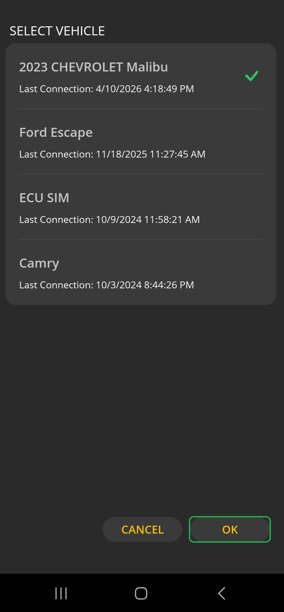 Android screen showing the Select Vehicle screen. A vehicle labeled "2023 Chevrolet Malibu" has a checkmark indicator. The OK button is highlighted.