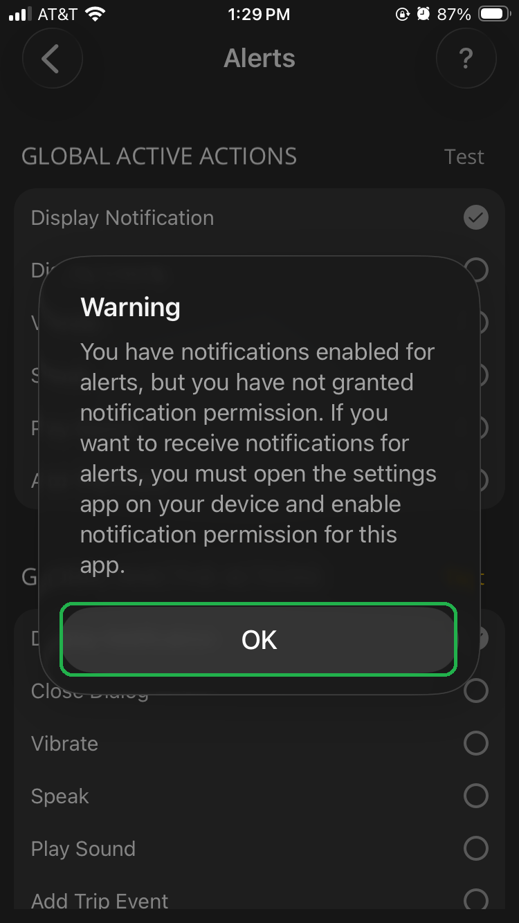 iOS Preferences screen showing a Warning message. The OK button is highlighted.