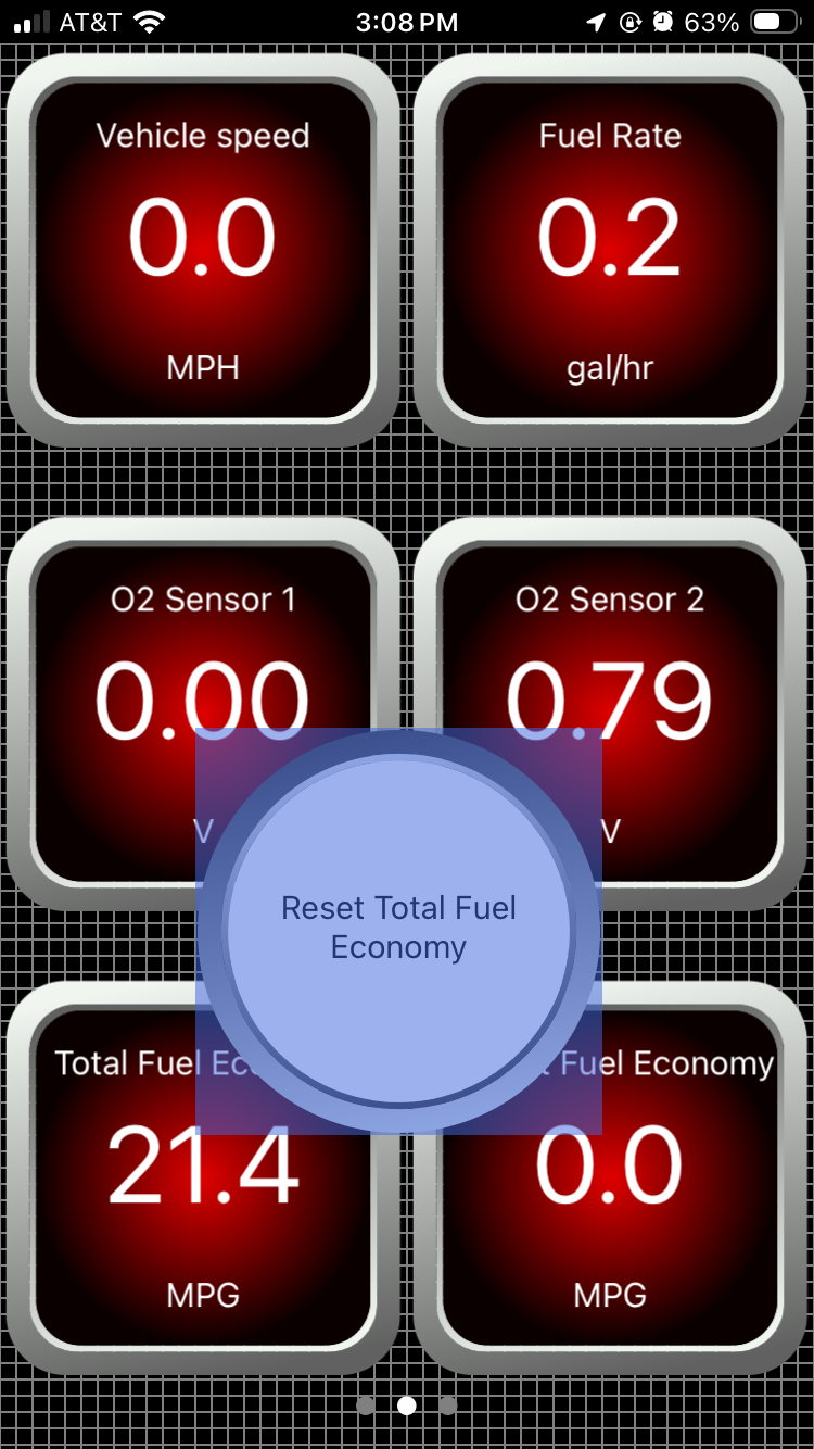 iOS Dashboard screen showing the drag and move view. The Reset Total Fuel Economy push button is shown with a shaded foreground.