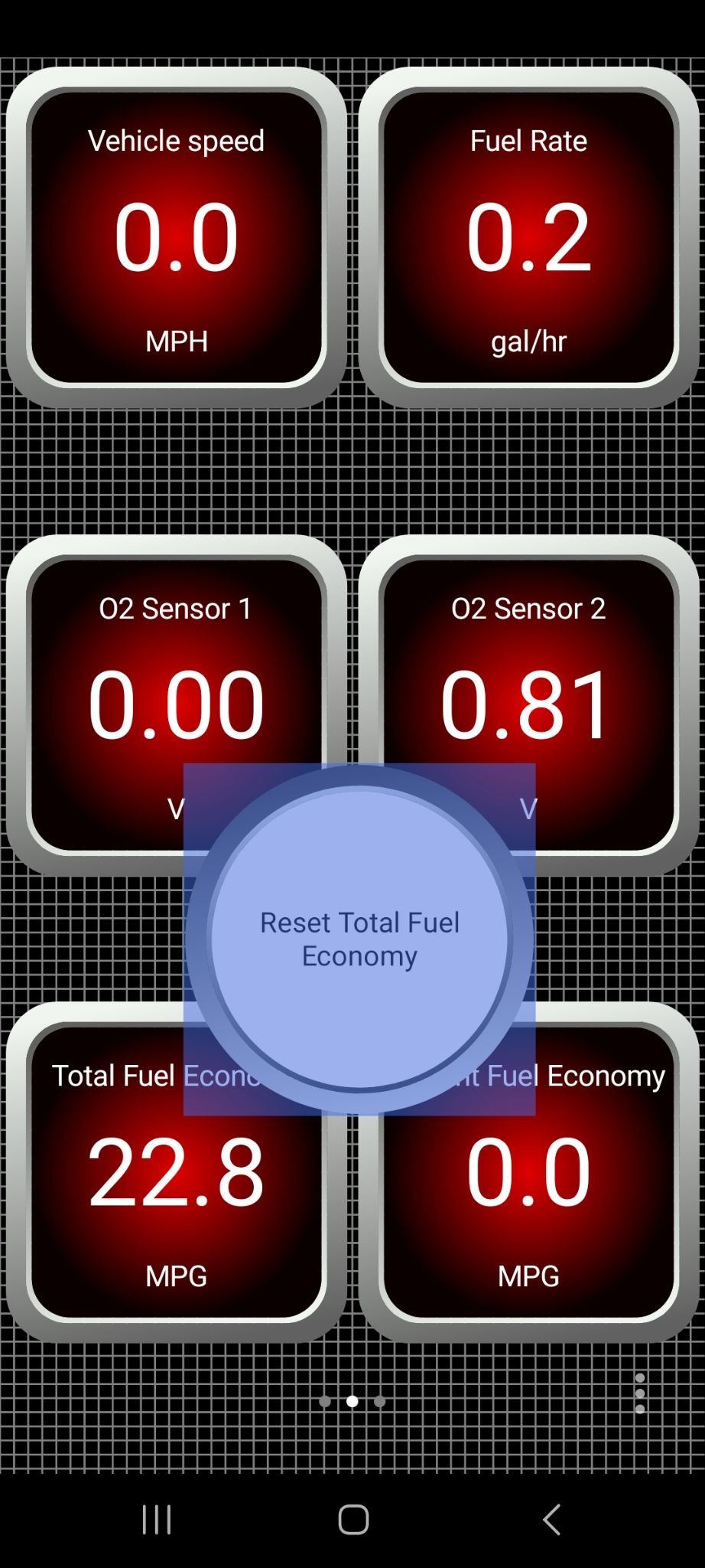 Android Dashboard screen showing the drag and move view. The Reset Total Fuel Economy push button is shown with a shaded foreground.