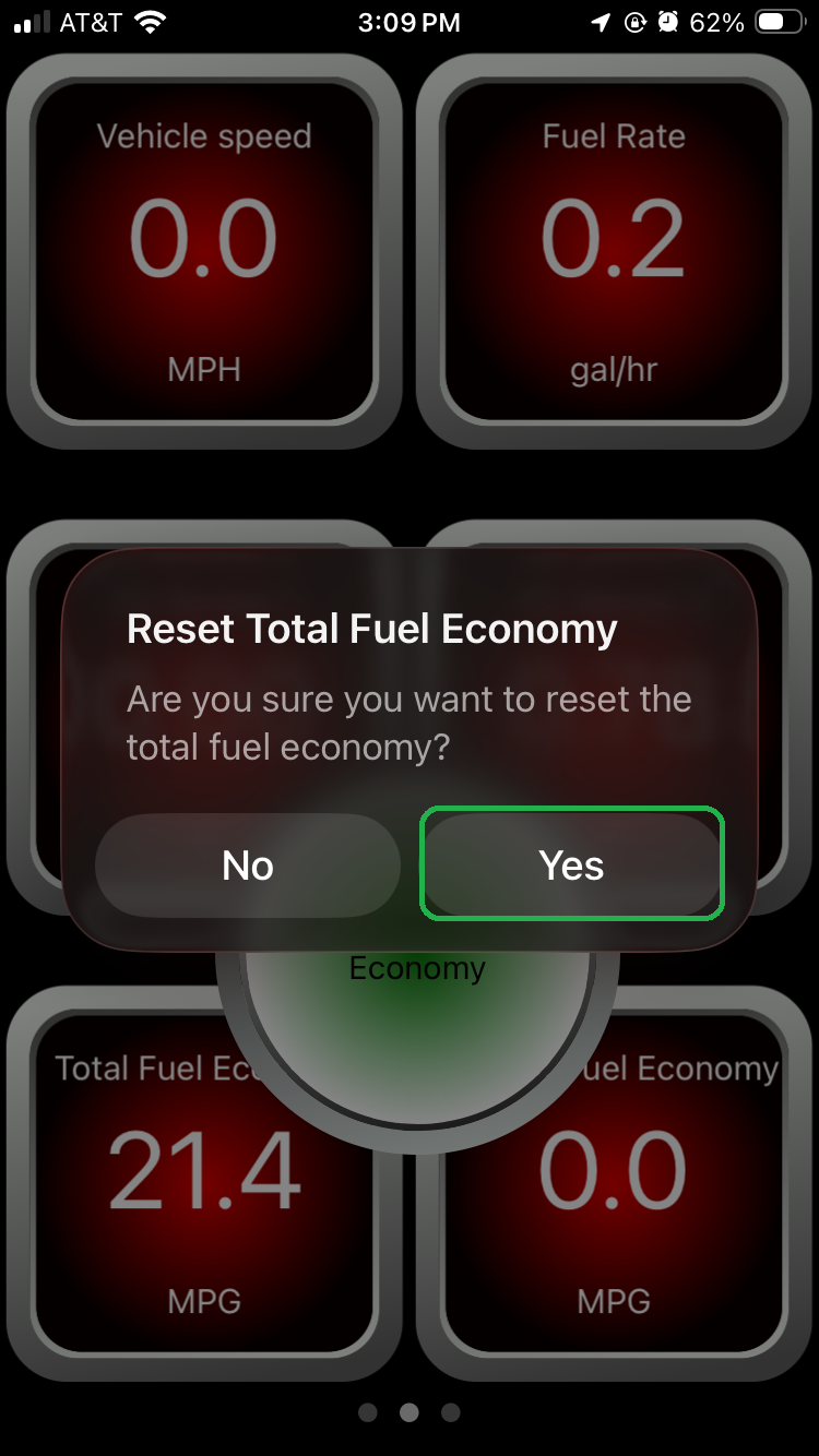 iOS screen showing a confirmation window about resetting the total fuel economy value. The Yes button is highlighted.
