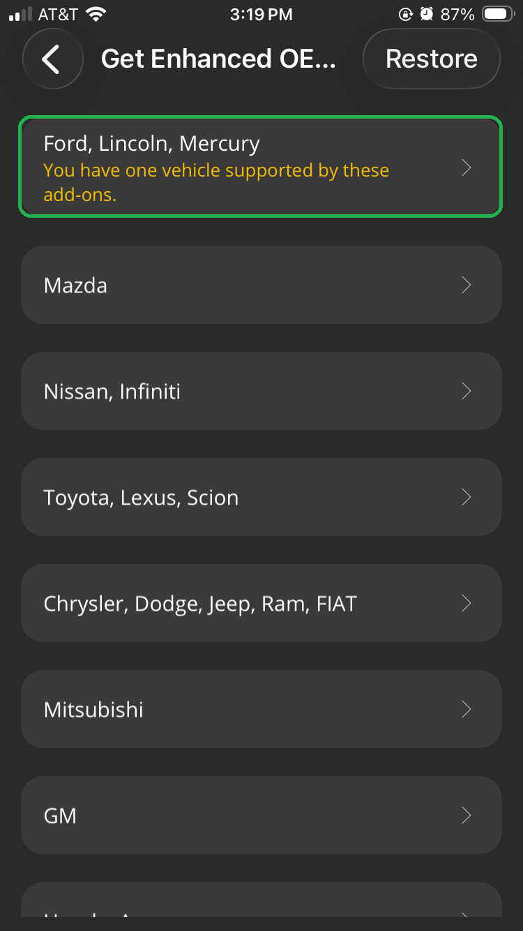 iOS screen showing Get Enhanced OEM Add-ons options. The Ford, Lincoln, Mercury option is highlighted.