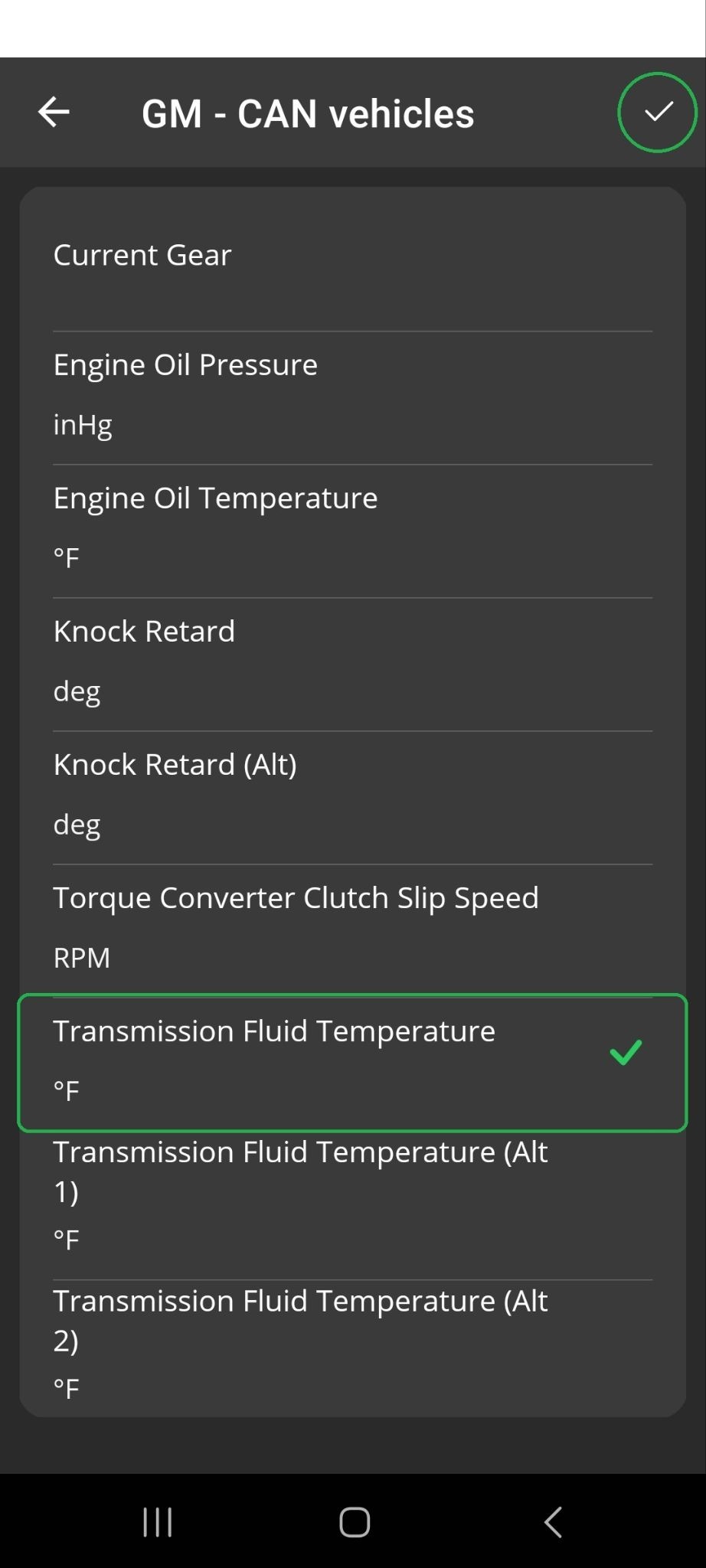 Android screen showing a list of GM - CAN vehicle PIDs. The item "Transmission Fluid Temperature" is highlighted. The checkmark in the upper right corner is also highlighted. 