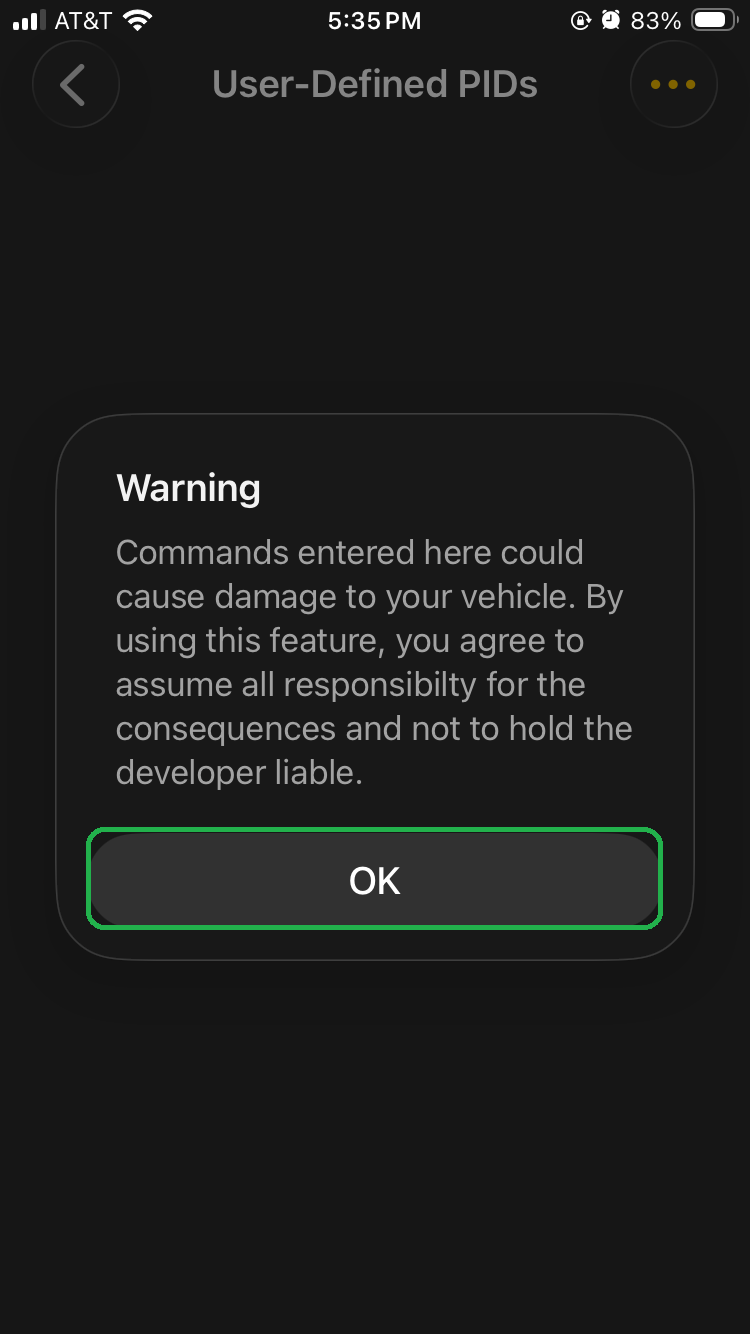 iOS screen showing the User-Defined PIDs screen. A Warning message is displayed. The OK button is highlighted.