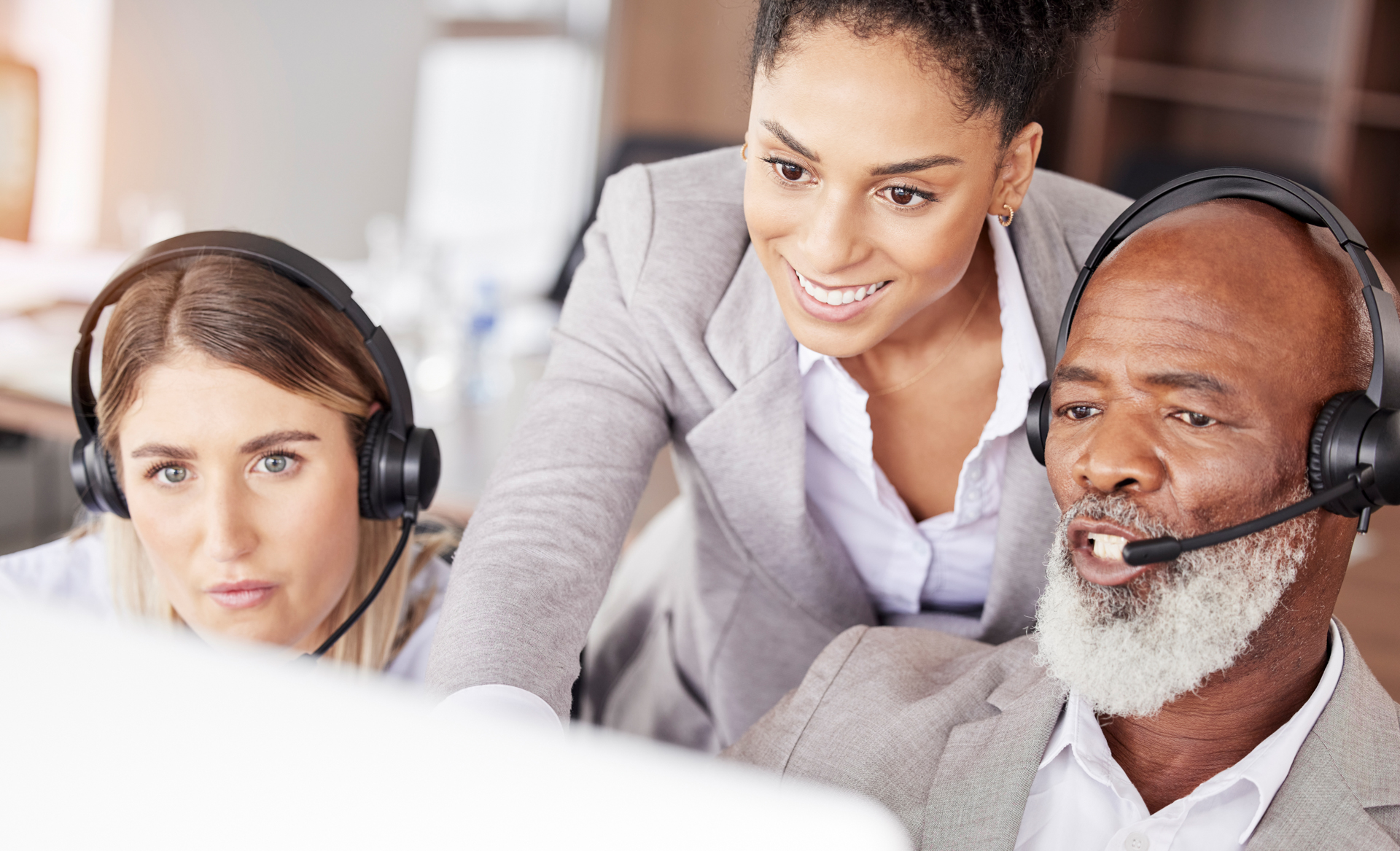 Traveler support agents assisting a customer