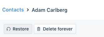 The Restore and Delete forever buttons on a deleted contact.