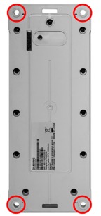 Title: Screw mounting points on the device - Description: Screw mounting points on the device