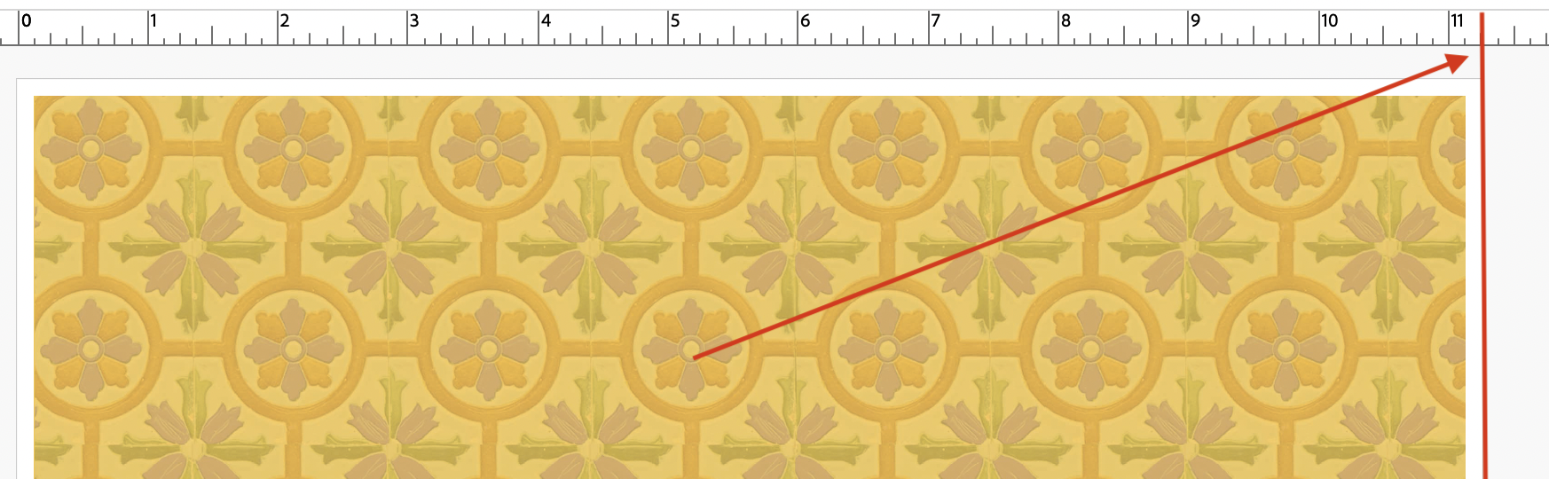 Primo piano di un PDF che mostra un margine di rifilo bianco errato, causato da un'illustrazione che non si estende fino alla linea rossa di rifilo.