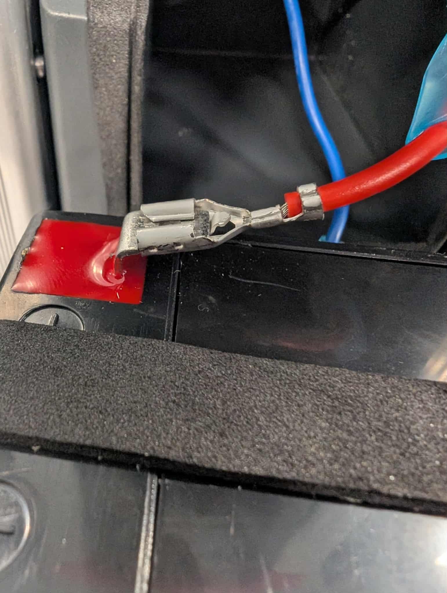Terminal wire attached to battery