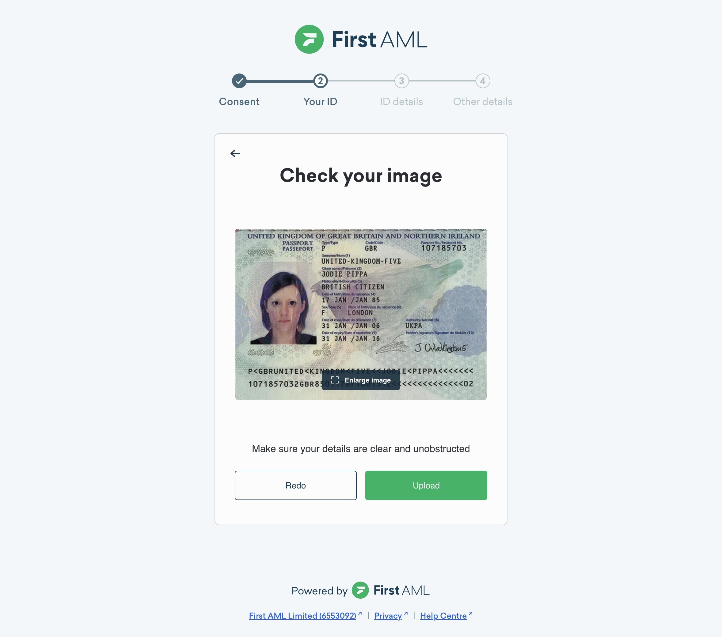 ID photo review screen with the Upload and Redo buttons.
