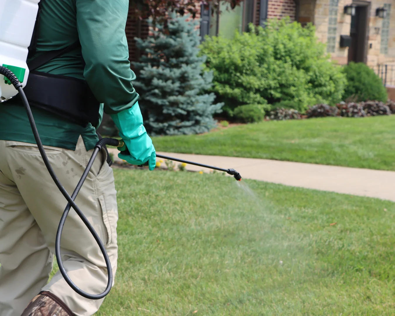 Man Spraying with FlowZone sprayer