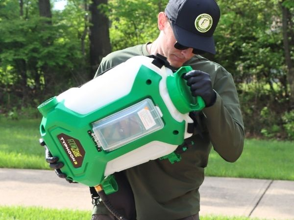 man holding flowzone typhoon sprayer