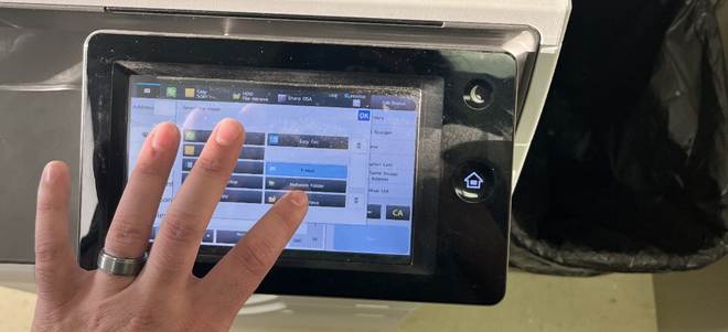 A hand touching a screen

Description automatically generated