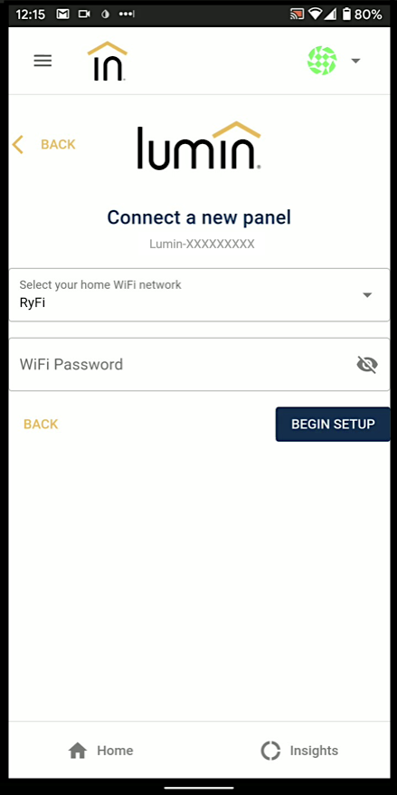 The Connect a New Panel screen of the Lumin Smart app. The two following fields are available: Select your home WiFi network and WiFi Password.