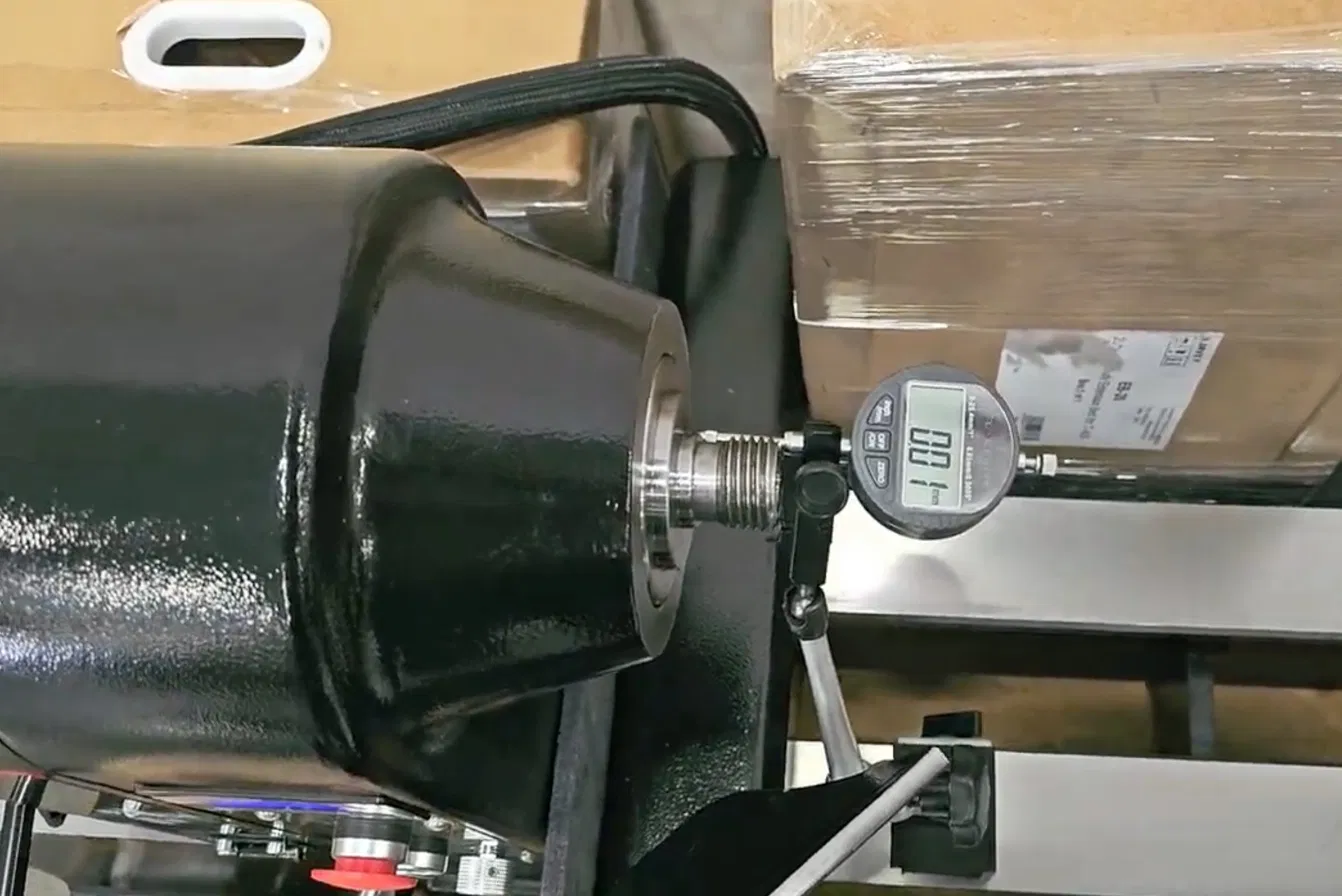 Dial indicator against spindle shoulder face