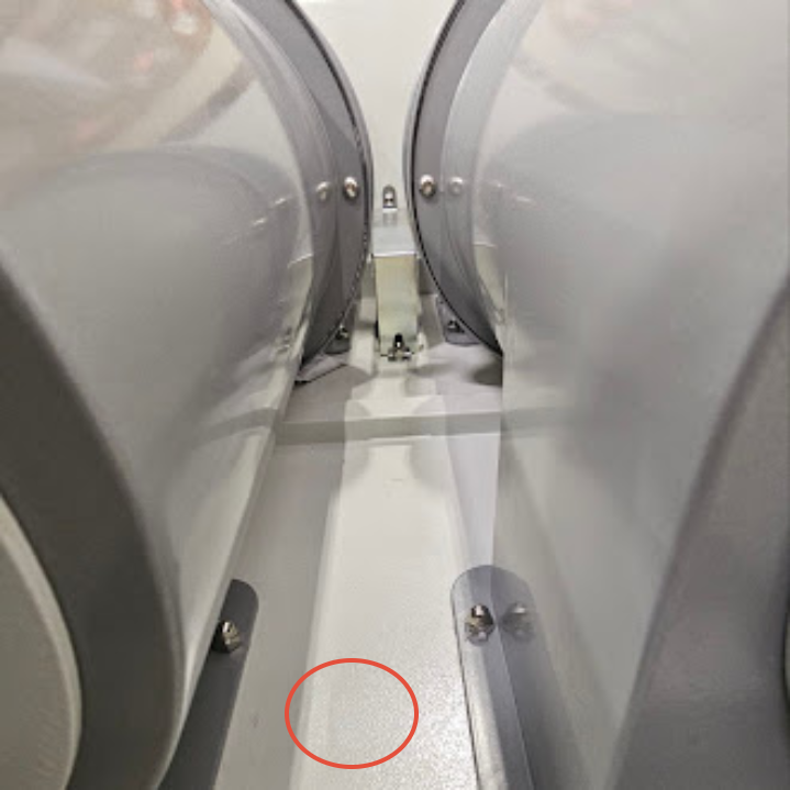 Sensor opening drilled centered above the small dust bin