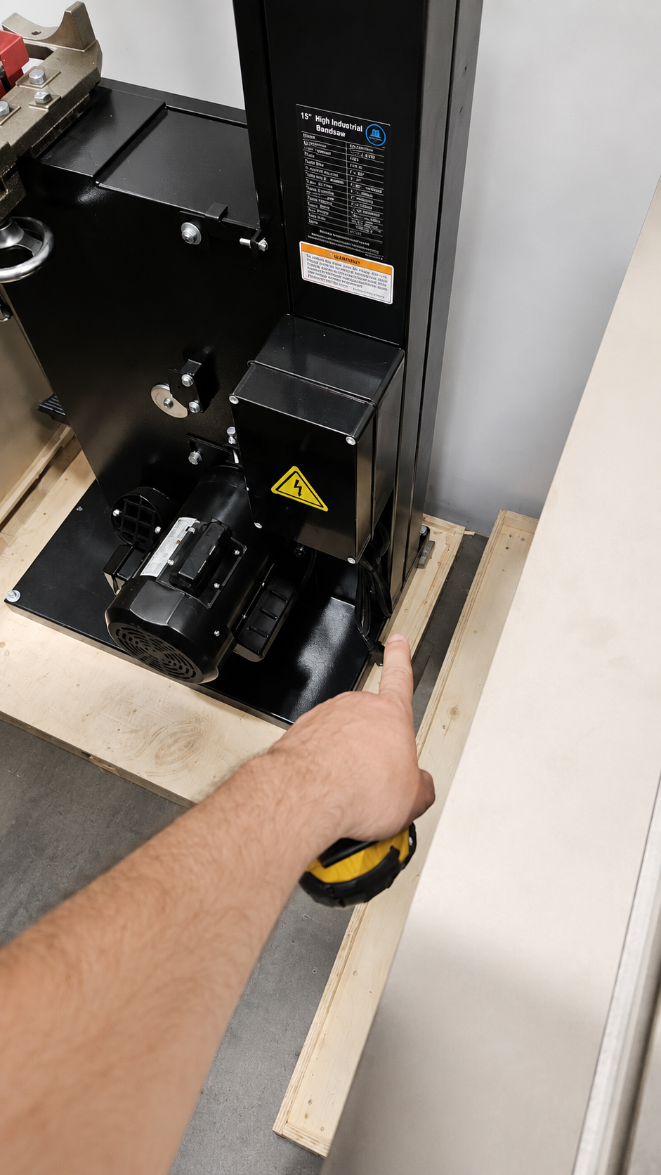 Spine side of the Alpha HW615 — the recommended side to lay the machine down on if required