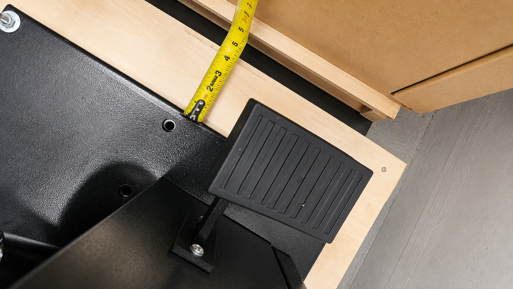 Brake pedal side bolt distance approximately 4.5 inches from outer edge — avoid laying on this side