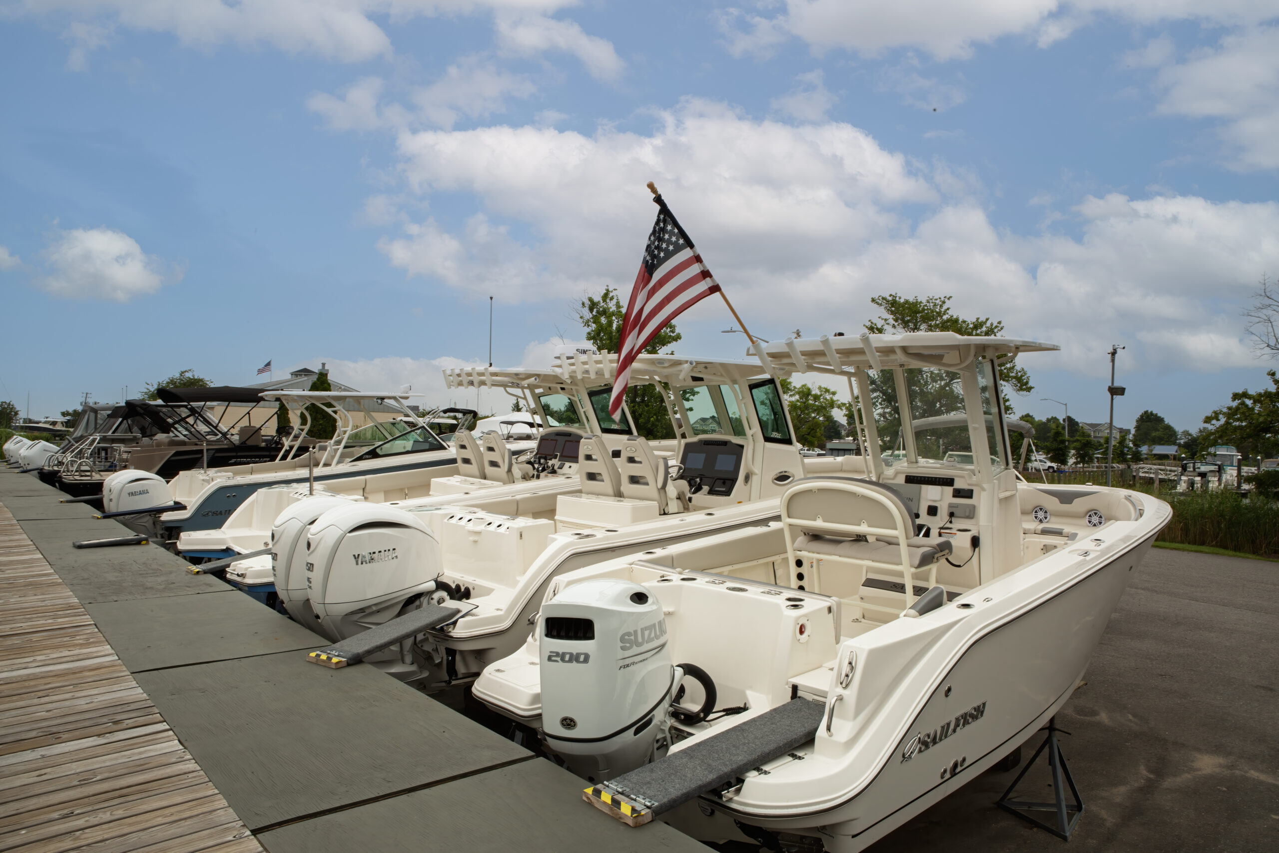 row of boats on a pier