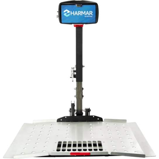 Harmar mobility platform lift with a metal base and a vertical handle, designed for accessible transportation of mobility devices.