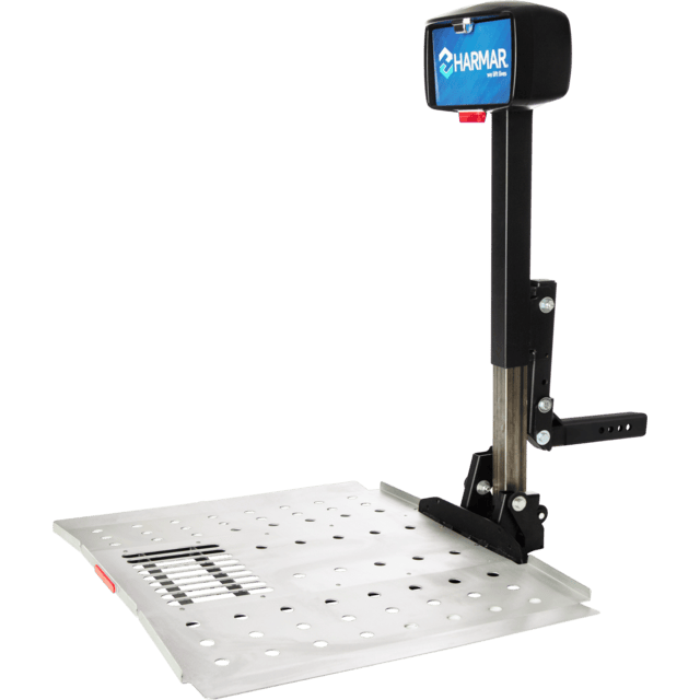 A mechanical platform lift with a rectangular base and vertical support, labeled "Harmar" at the top.